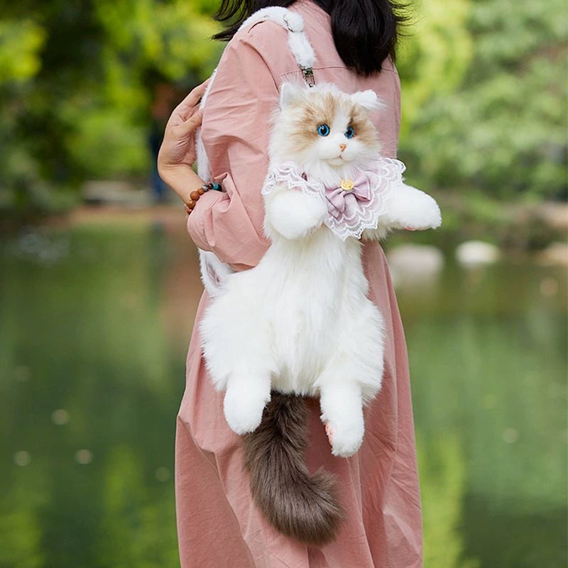 An adorable cat-shaped backpack! 🐾🎒